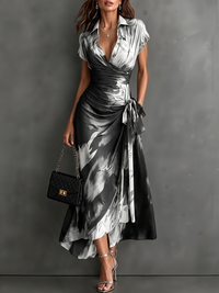Midi Wallet Dress with Abstract Print in White, V-Neck Collar, Short Sleeves, Waist Tie, Asymmetrical Hem with Ruffles
